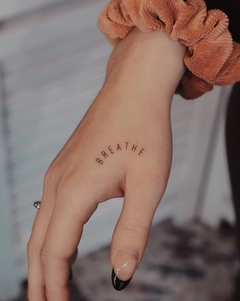 "Breathe" Side-Hand Tattoo