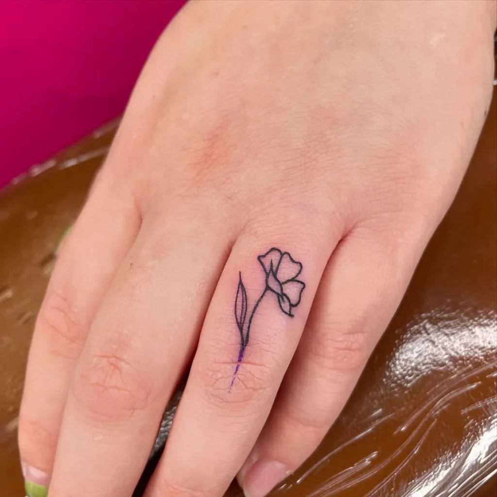Daisy Finger Tattoo