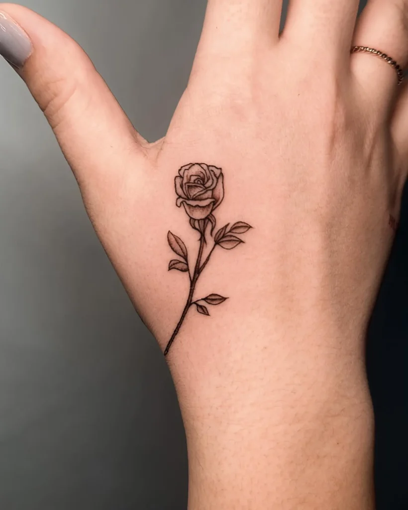 Mini Rose Hand Tattoo