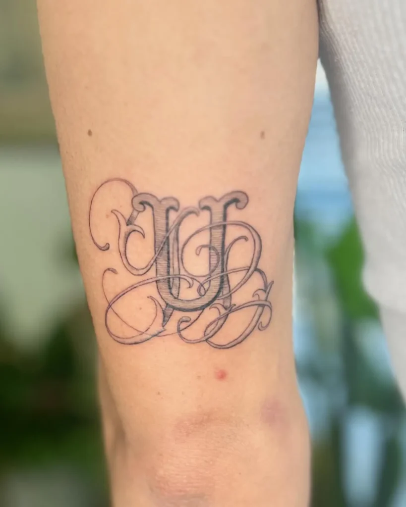 Single Letter Monogram Tattoo