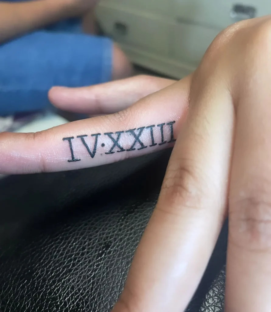 Roman Numerals Tattoo