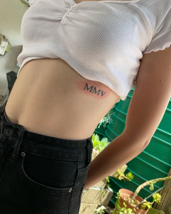 Roman Numerals Tattoo