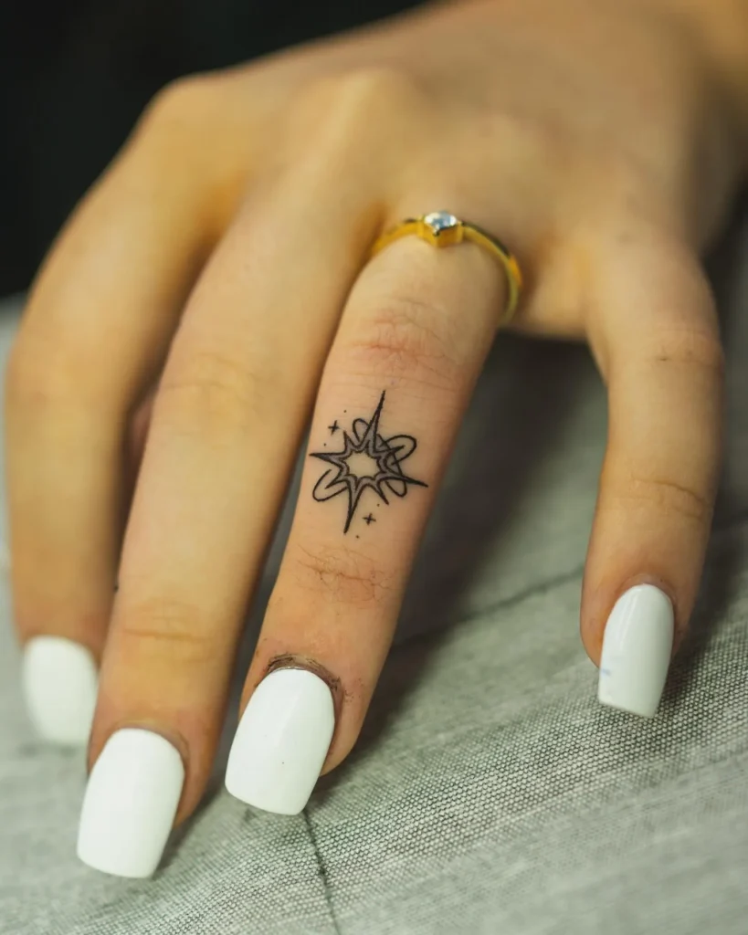 Sun Symbol Tattoo