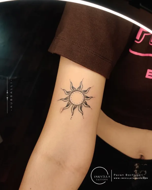 Sun Symbol Tattoo