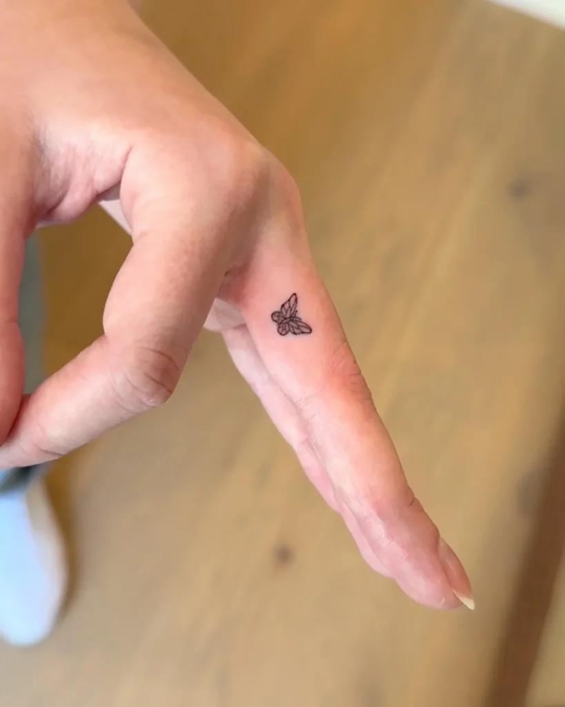 Tiny Finger Butterfly Tattoos