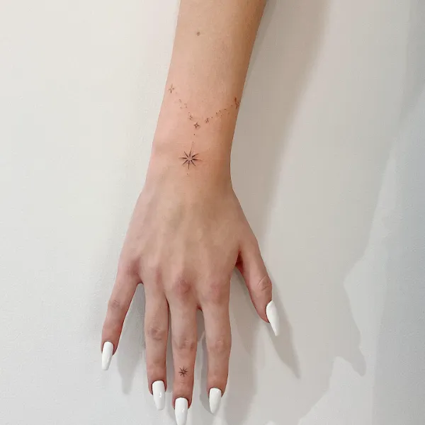 Tiny Star Tattoo