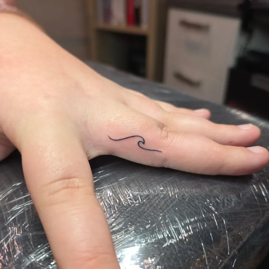  Tiny Wave Tattoo
