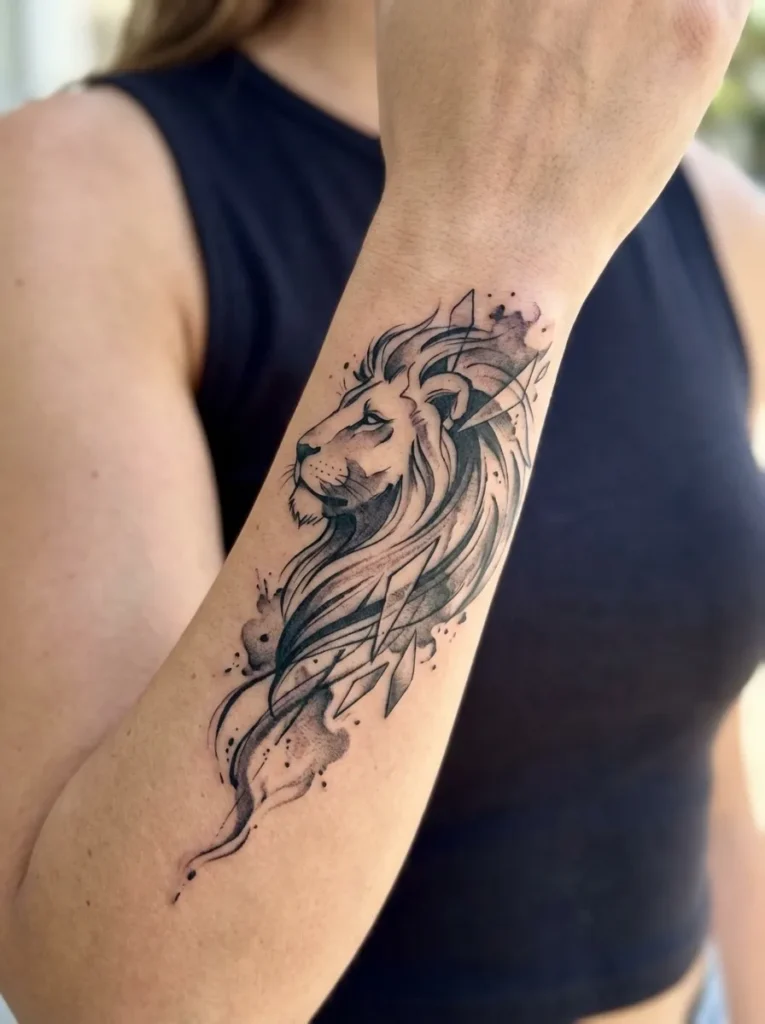 Lion Wrist Tattoo with Soft Abstract Elements