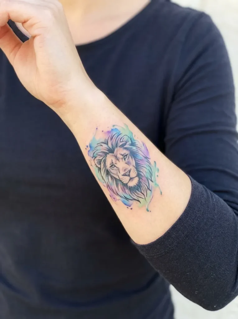Lion Wrist Tattoo with Watercolor Accent