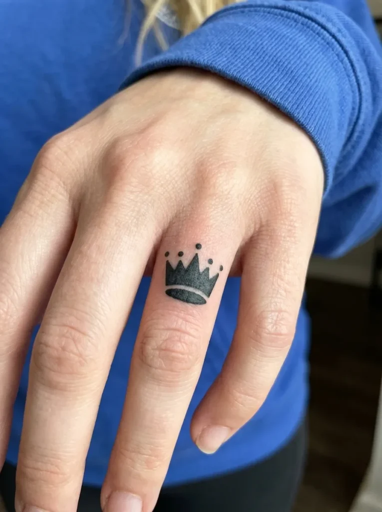 Crown Finger Tattoo
