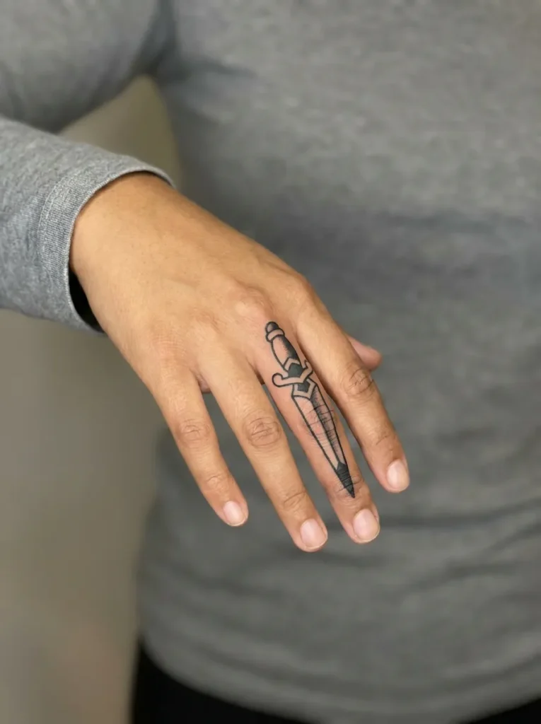 Dagger Finger Tattoo