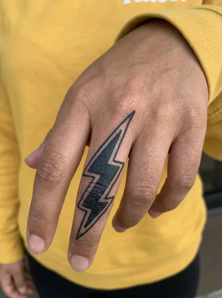 Lightning Bolt Finger Tattoo