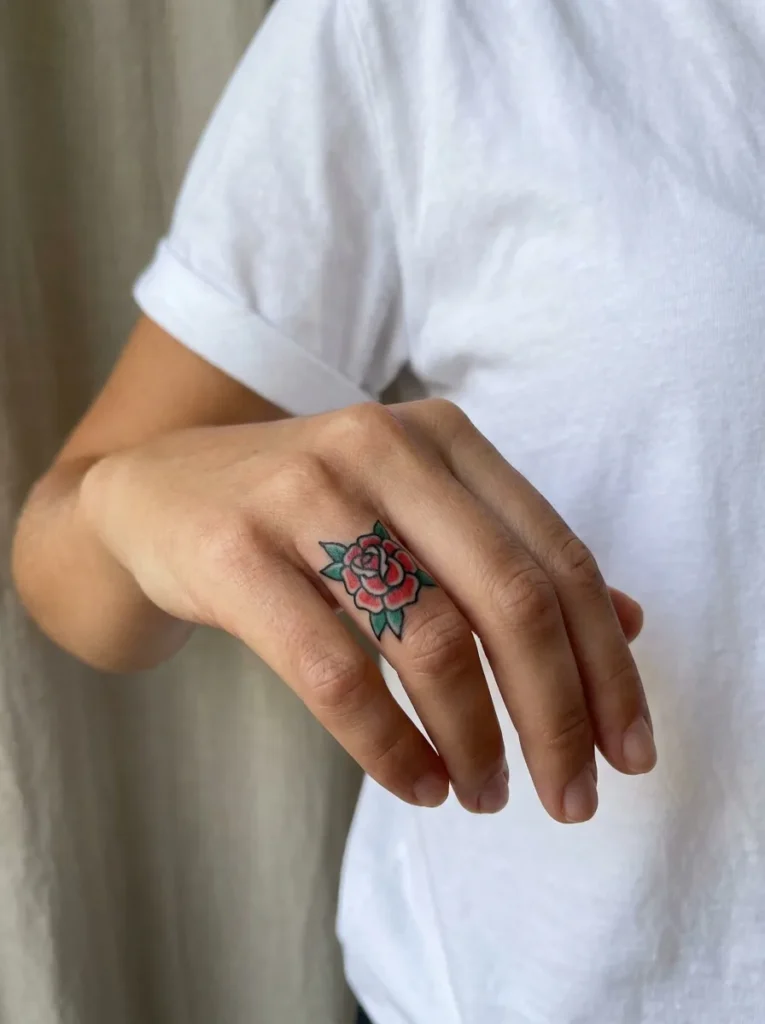 Rose Finger Tattoo