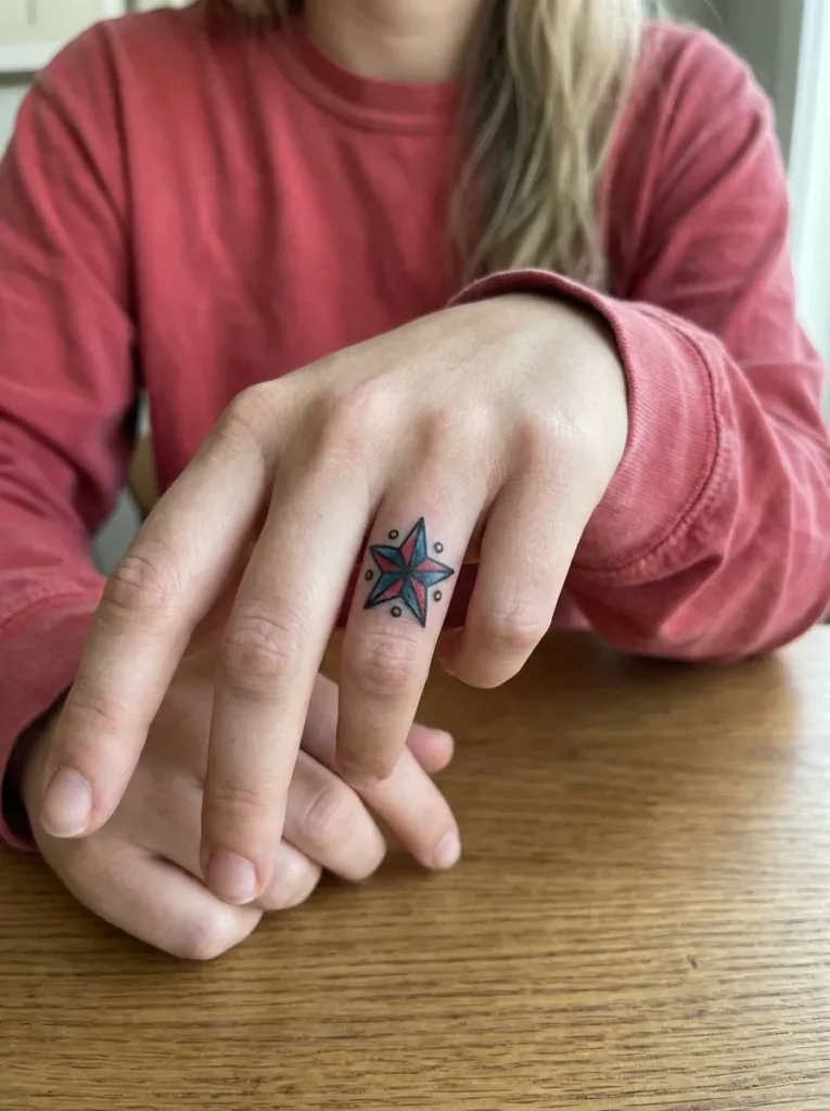 Star Finger Tattoo