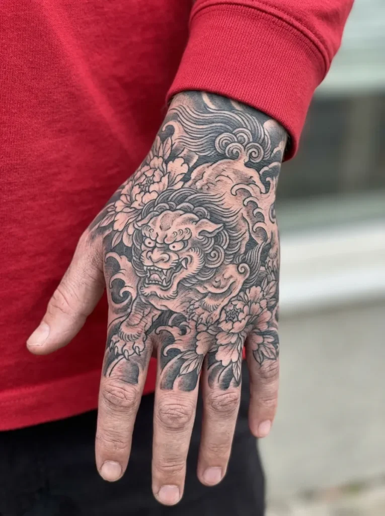 Karajishi Hand Tattoo