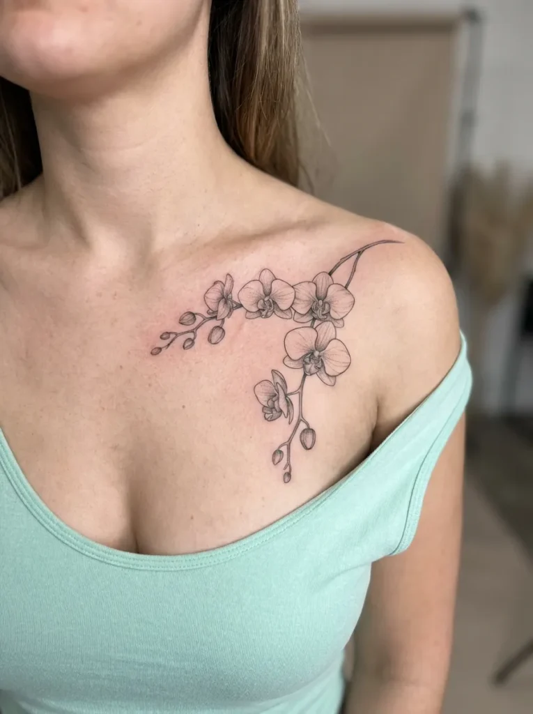 Orchid Flower Collarbone Tattoo