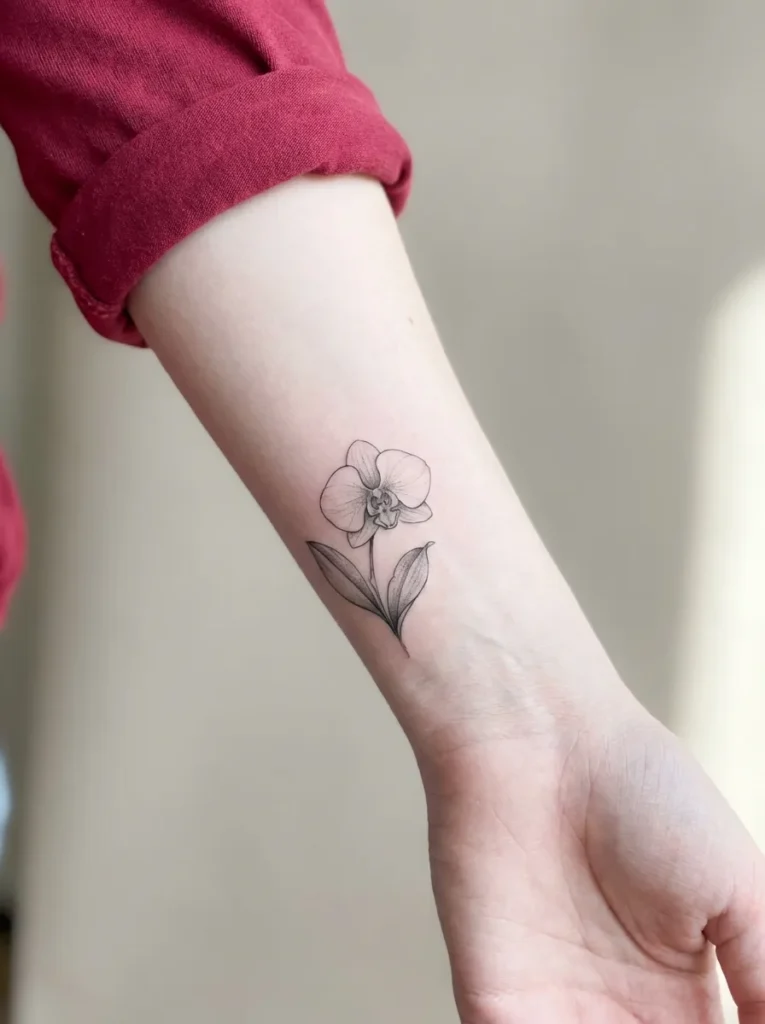 Orchid Flower Wrist Tattoo