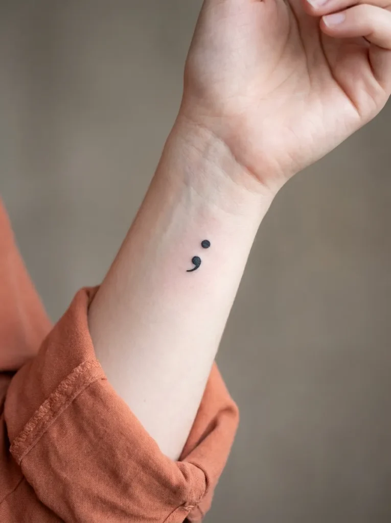 Small Semicolon Symbol Hidden Tattoo