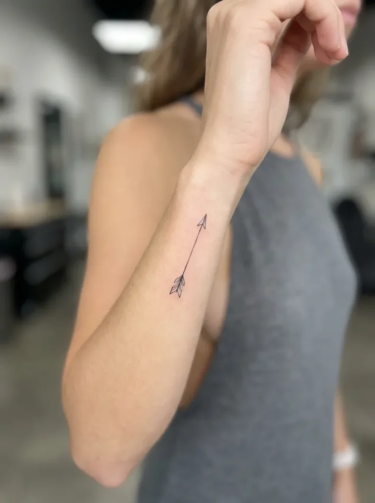 Tiny Arrow Symbol Hidden Tattoo