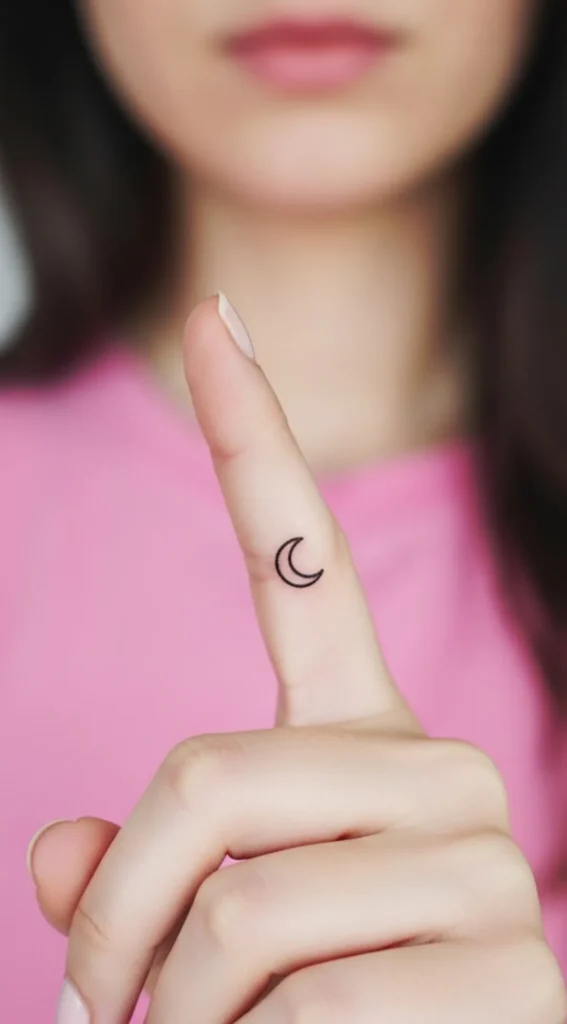 Tiny Moon Inner Finger Tattoo