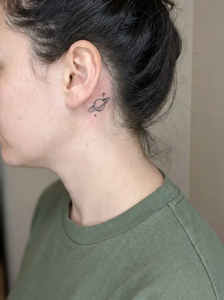 Tiny Planet Behind Ear Tattoo