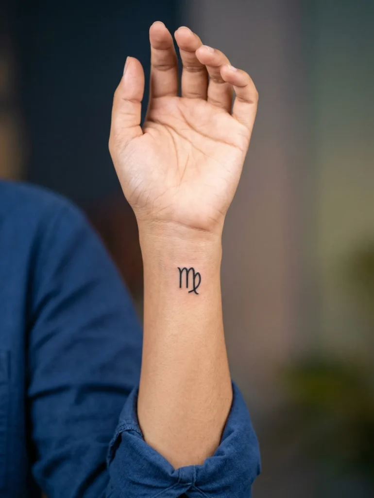 Tiny Zodiac Symbol on Inner Wrist